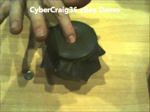 Coin Penetration Thru Rubber Magic Trick