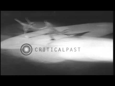 A couple participates in a figure skating competition in Canada. HD Stock Footage