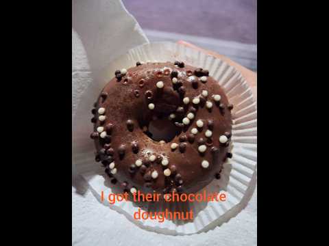 Trying hesburger chocolate doughnut for first time #fastfood #doughnut #chocolate #sweet #desert