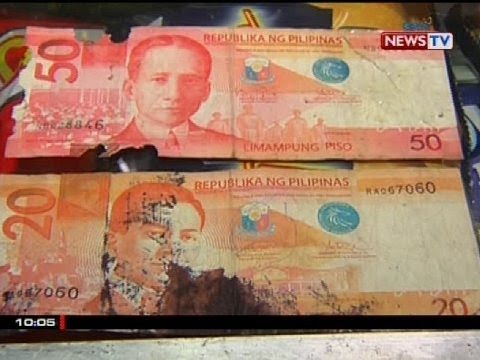 BSP: Bawal sa batas ang sadyang pagtupi, pagpunit o pagsusulat sa pera