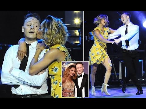 Strictly's Karen Clifton shares a kiss with husband Kevin on stage during their dance tour