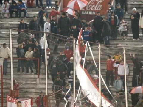 "Ingreso de La Banda con el Rojo www.locosporelglobo.com.ar" Barra: La Banda de la Quema • Club: Huracán • País: Argentina