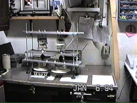 Asymmetric Mass System Moving Across Tabletop