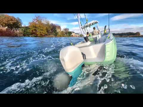 Center console sports fishing boat testing new engine, scratch built .