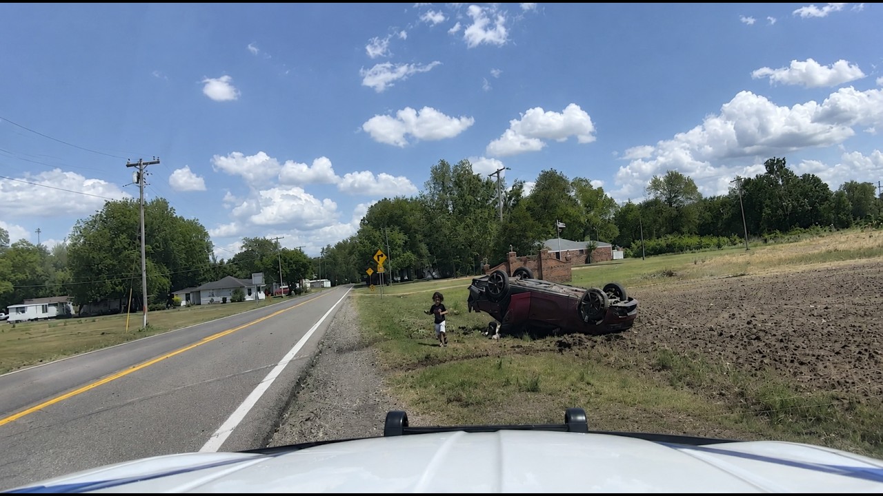 Trooper PITs Dodge Charger — Toddler Climbs Out After Rollover 🚨