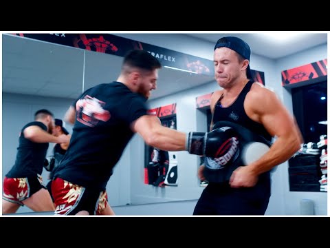 I took punches & kicks from an MMA Pro (bad idea)