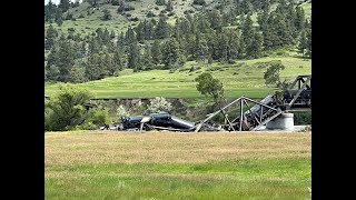 Footage of bridge collapse and train derailment near Reed Point, Montana