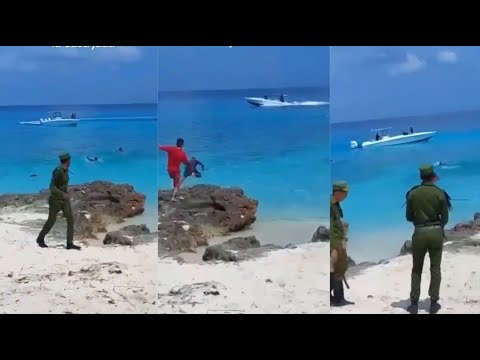 Lancha rápida entra a playa de Pinar del Rio y recoge a varios cubanos frente a oficiales del MININT