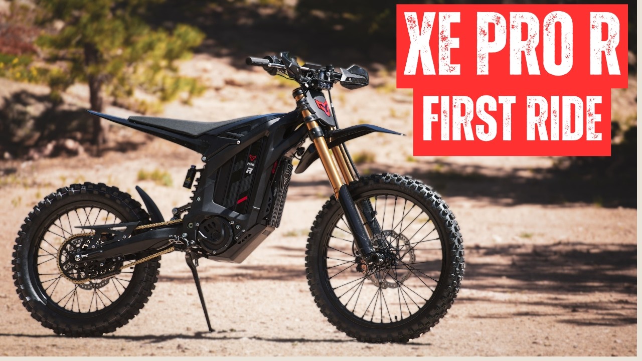 2026 Arctic Leopard XE Pro R electric dirt bike on a mountain trail