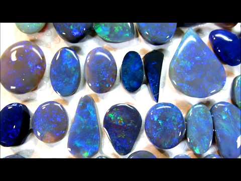 Rough Rubbed Solid Black Opal Parcel – 44 Opals – 340cts