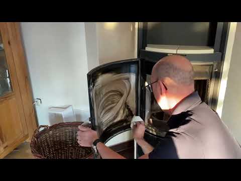 Cleaning A Stove's Glass Door Using Aqueous Ozone Spraybottle