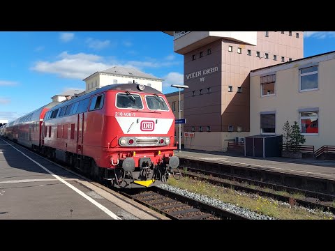 BR 218 406 - 7 mit dem RE 2 bei der Ausfahrt aus dem Bahnhof Weiden.