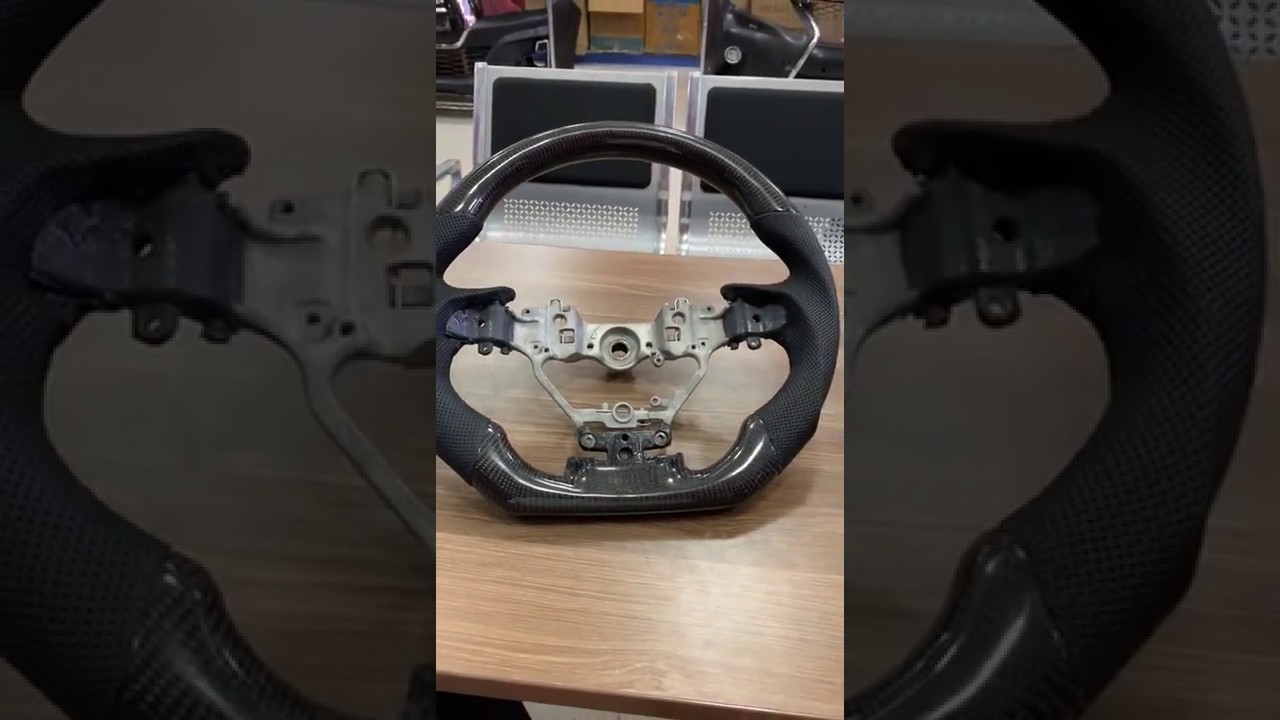 Кермо у зборі анатомічний (карбон) Video 1