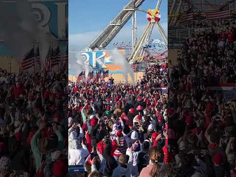 Trump steps onto the stage at his campaign rally at the Jersey Shore