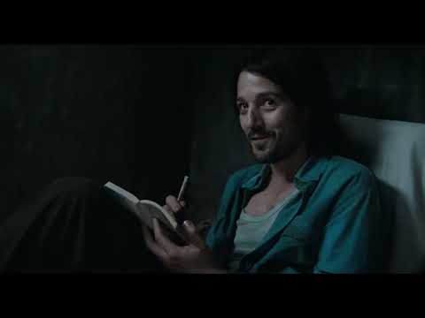 2025 film trailer frame: Jennifer Lopez as the Spider Woman looming over a spotlighted stage tableau