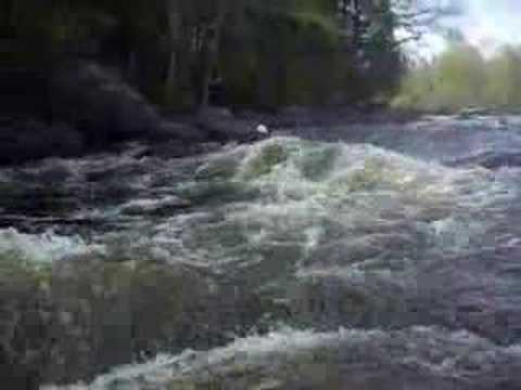 Mickey and Melaine riverboarding on the wolf