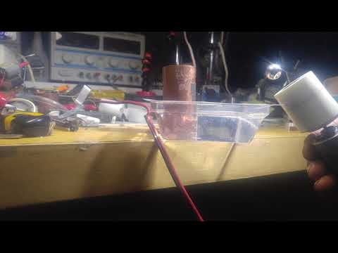 Trapping and raising a submerged magnet through container wall under MBS (20171215 013642)