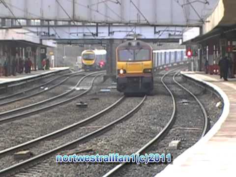 EWS livery class 92001 was working the (4s43) tesco express train at lancaster on the 26/03/2011