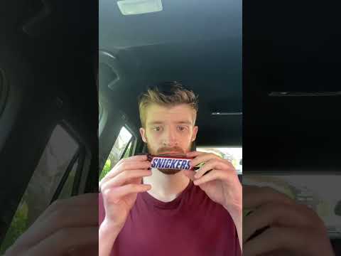 Trying a Snickers bar for the first time!