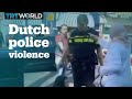 Dutch Police Officer Hits Muslim Woman