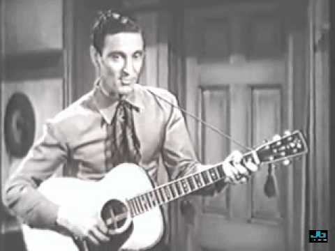 Ernest Tubb - Walking the Floor Over You (from the 1943 movie, Fighting Buckaroo)