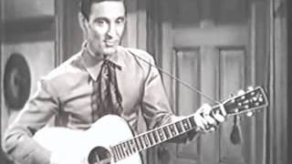 Ernest Tubb - Walking the Floor Over You (from the 1943 movie, Fighting Buckaroo)