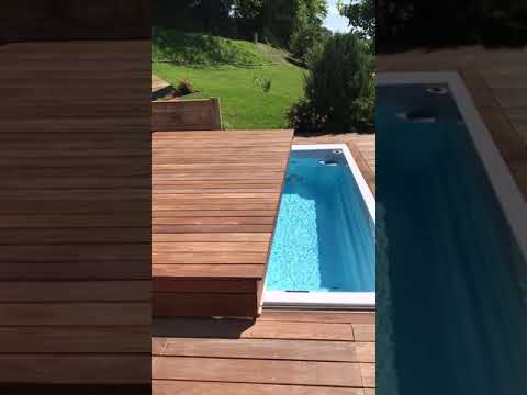 Idol swim spa pool with rolling deck.