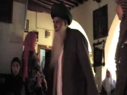 Women kissing hand of Hisham