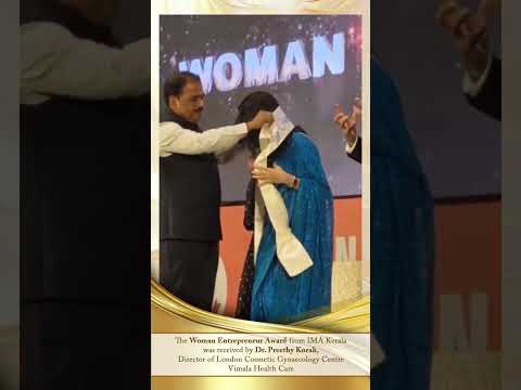 Dr. Preethy Korah, Director of the LCGC Vimala Hospital, receives the Woman Entrepreneur Award