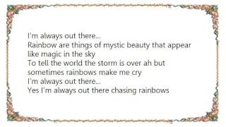 Buck Owens - Out There Chasing Rainbows Lyrics