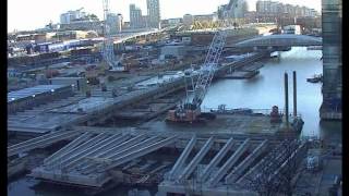 preview picture of video 'Crossrail time lapse video: Draining of North Dock for Crossrail Canary Wharf station'