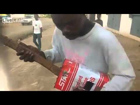 Liberian blind man is successful on the internet with tin guitar.