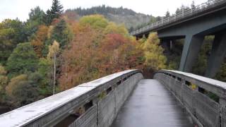 preview picture of video 'Autumn Clunie Footbridge Over Loch Faskally Pitlochry Highland Perthshire Scotland'