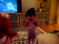 Isabella December 27 2010 Having Fun With Tickle Me Elmo