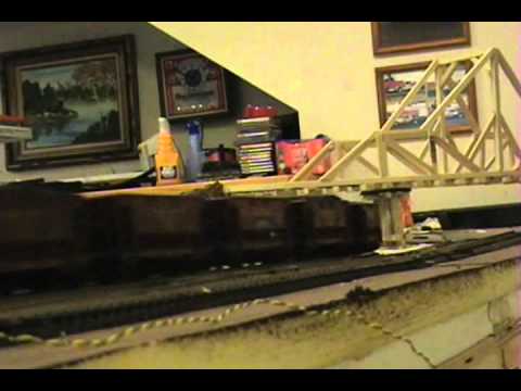 Trains, Prairie 2-6-2 pulling 10 ore cars on layout .wmv