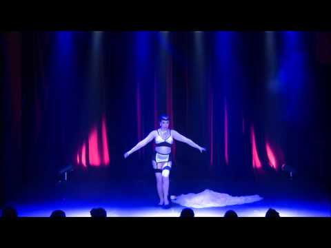 Evie Libertine performs burlesque solo Big Long Slidin' Thing with boa and gown