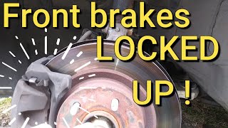 nissan front brakes locking up - altima