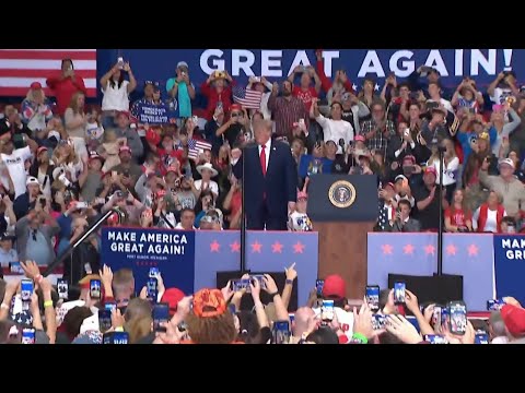 Trump and Obama rally supporters in key battleground states ahead of midterms