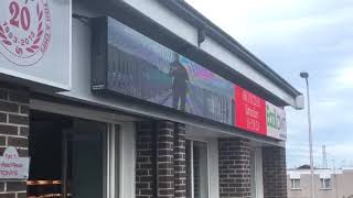 Furvah&#39;s &quot;Show Me Suttin&quot; playing on a Billboard in Dundee, Scotland