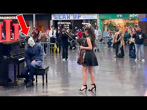 Michael Myers interrupted by Cat Woman at the airport. Shocked crowd!