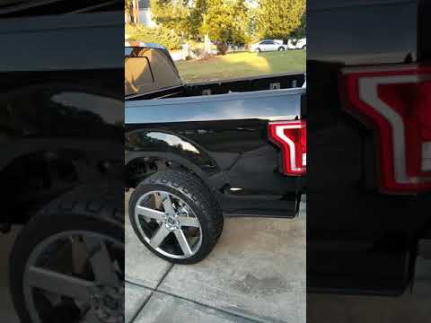 Black Diamond F150 sitting Dub Ballers 24s.