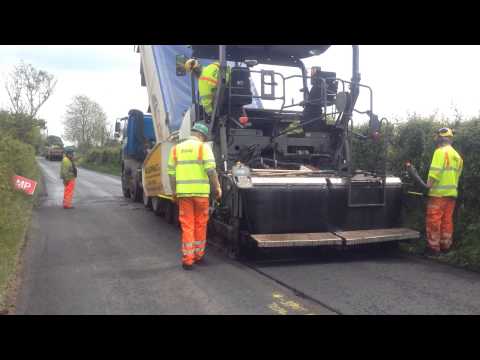 Machine Laying Asphalt 4