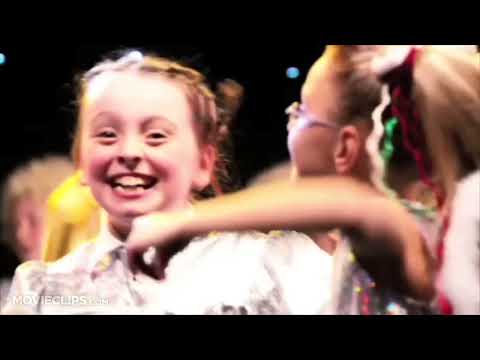 Nativity! trailer still featuring children performing on a cathedral stage