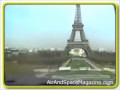 plane flys under the eiffel tower