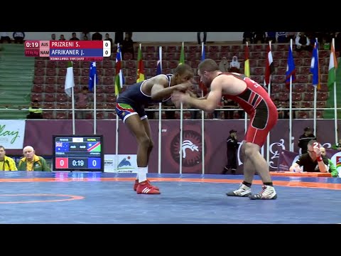 1/2 FS - 65 kg: S. PRIZRENI (AUS) df. J. AFRIKANER (NAM) by FALL, 11-2