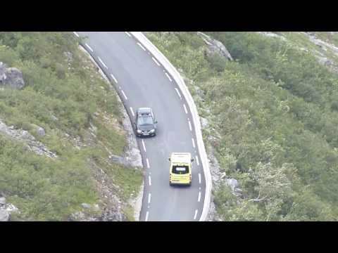 2 Norwegian Ambulances driving up the Trollstigen