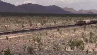 preview picture of video 'Union Pacific in the Mojave National Preserve - Cima Summit'