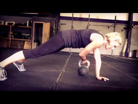 Plank with Kettlebell Drag-Through