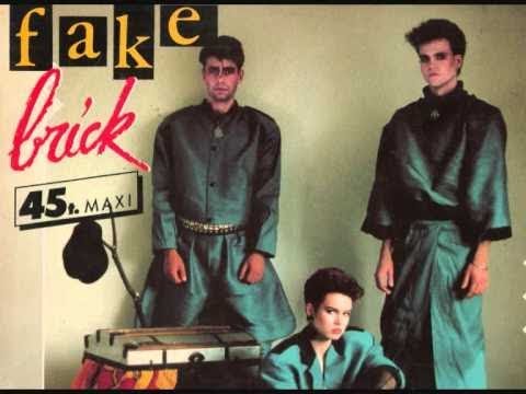 download lagu mp3 mp4 Fake Another Brick Lyrics, download lagu Fake Another Brick Lyrics gratis, unduh video klip Fake Another Brick Lyrics