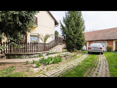 Szentlőrinc belvárosi utcájában eladó egy kétlakásos, összkomfortos családi ház - H426855